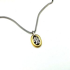 Silver and Gold Tone Necklace Oval Pendant with Cross design  by Brighton
